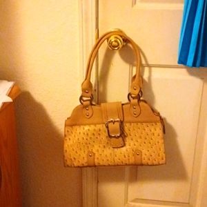 A tan purse! Great shape, like new.